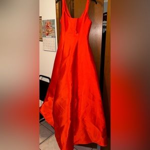 Long orange red dress perfect for any occasion!